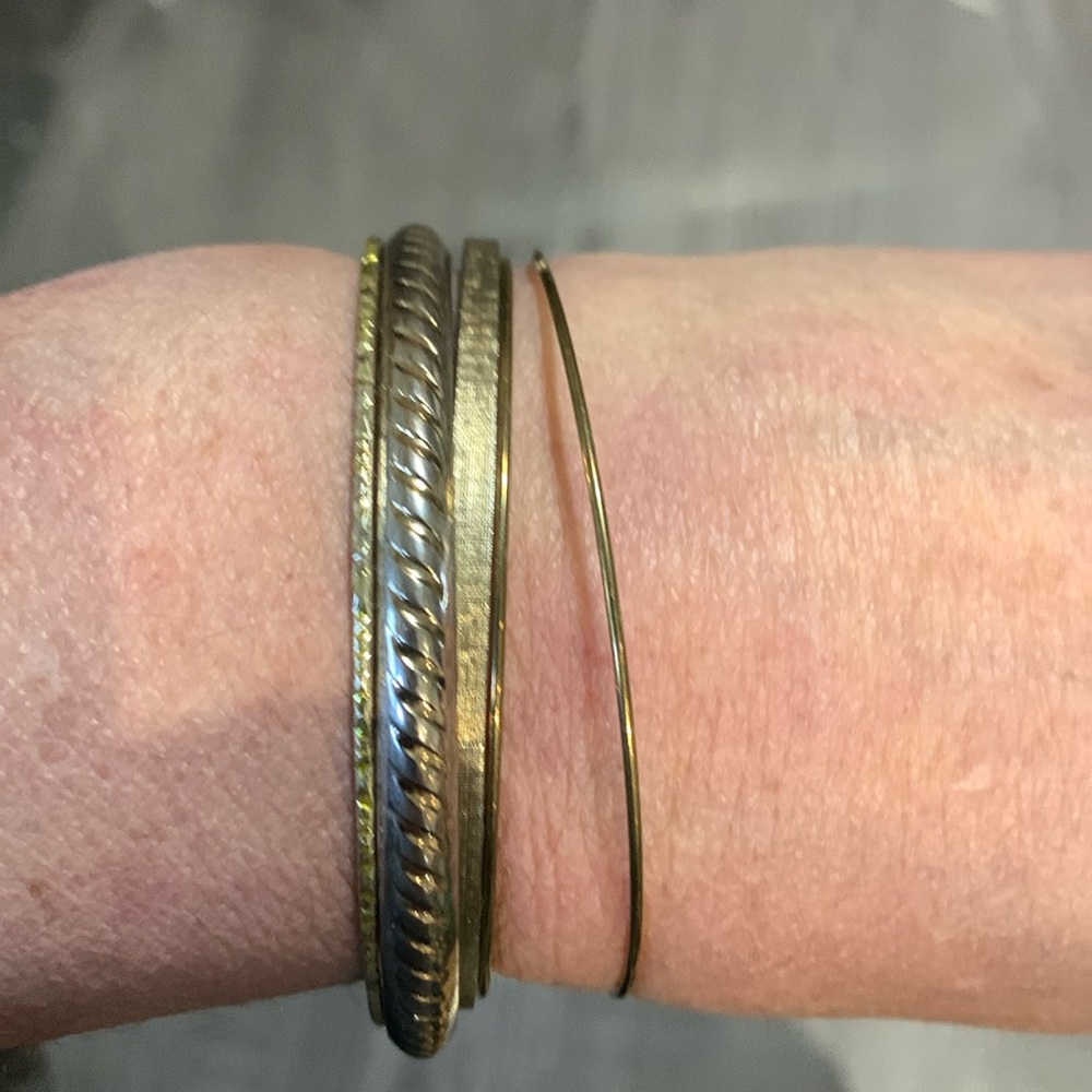 Five bangle bracelets